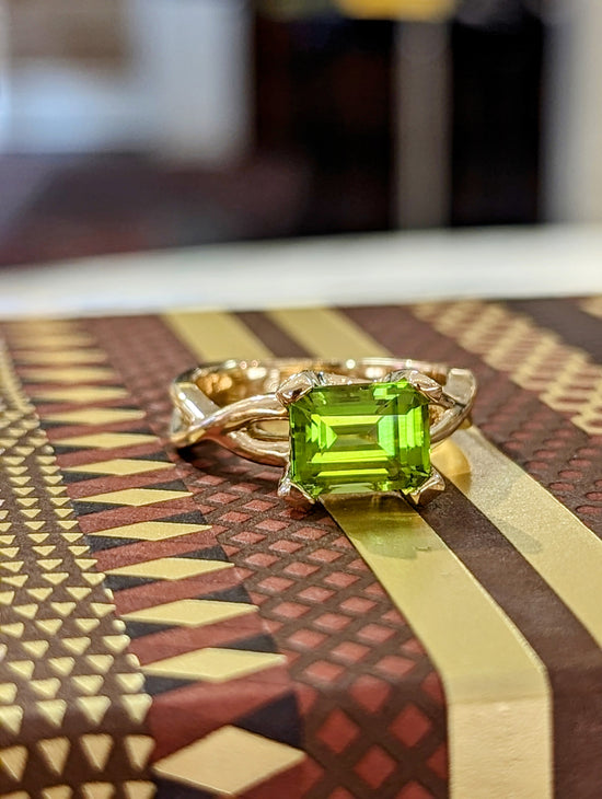 Emerald Cut Peridot Twisted Shank Ring