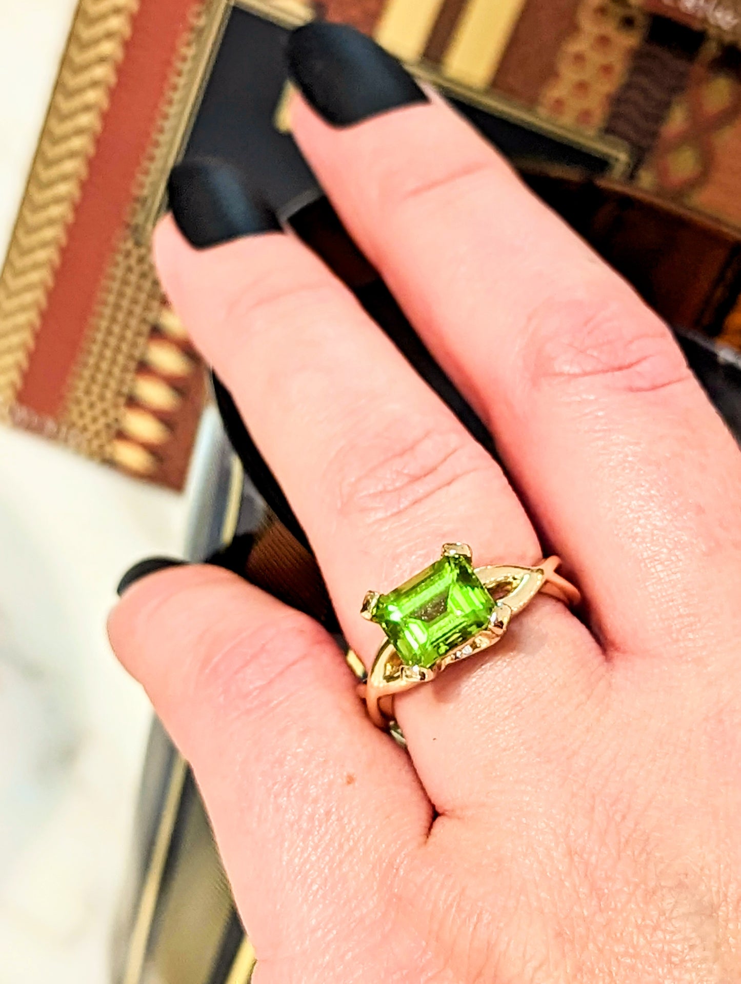 Emerald Cut Peridot Twisted Shank Ring