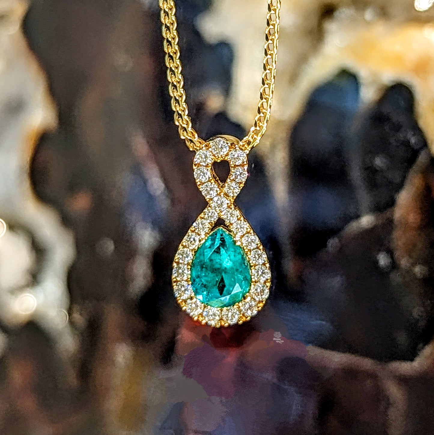 Infinity Emerald Pendant