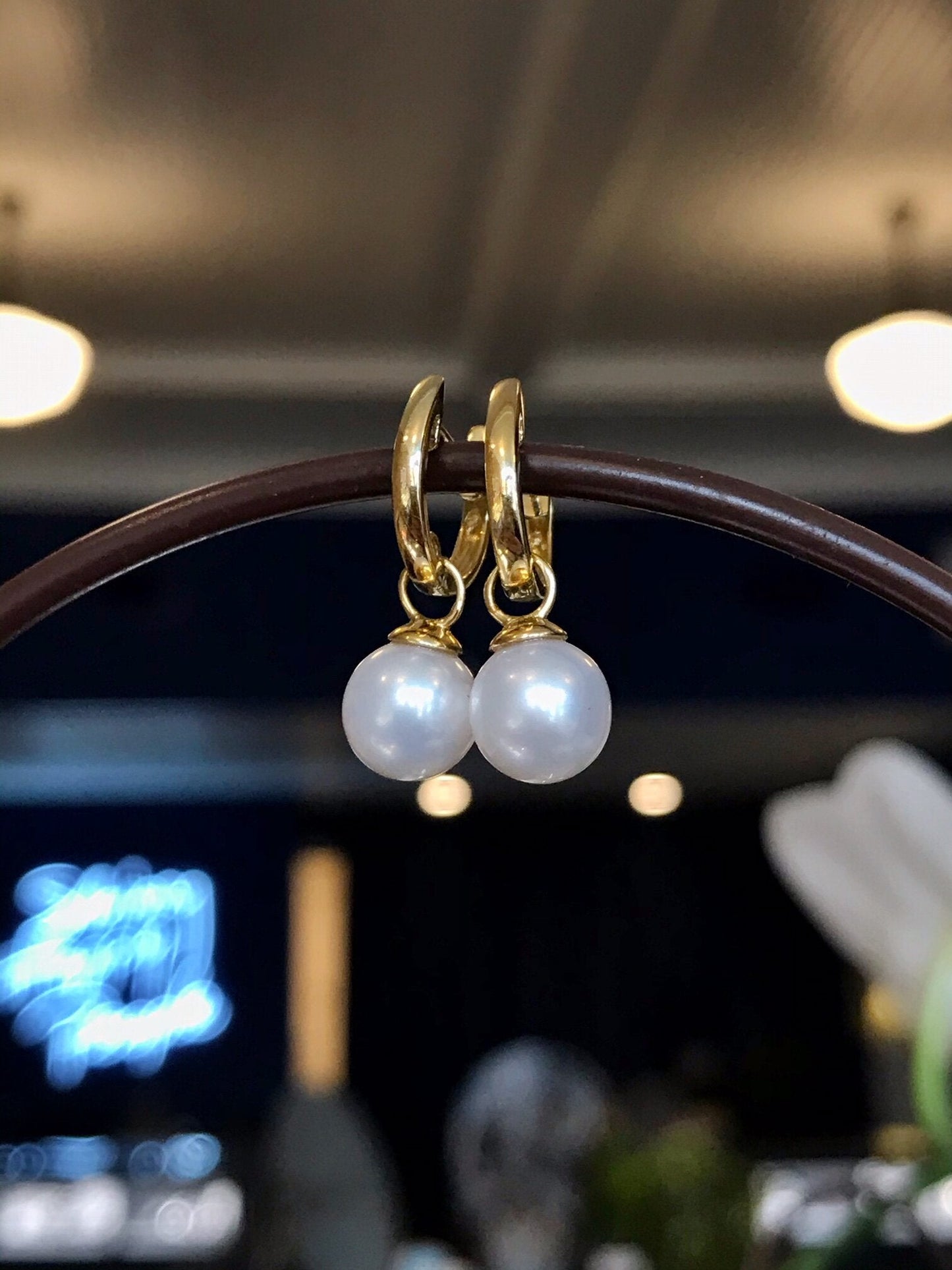 Photo of Pearl Dangles in a decorative scene, designed by , available at Plumb Gold & Plumb Silver