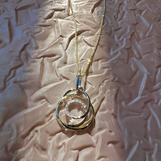 Two Tone Diamond Swirl Pendant