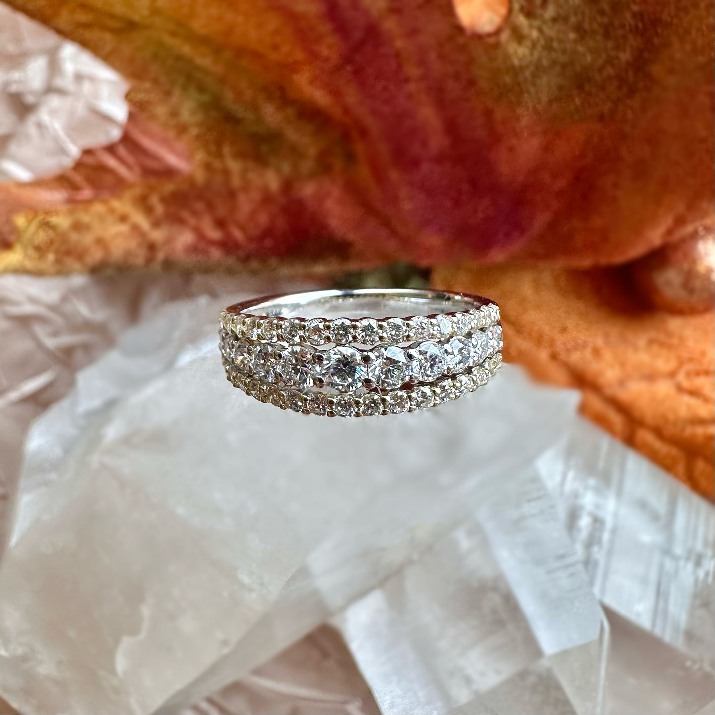 triple diamond band on a crystal with leaf in the background