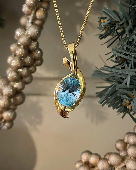 Load image into Gallery viewer, Plumb Gold Original Blue Topaz Swoop Pendant
